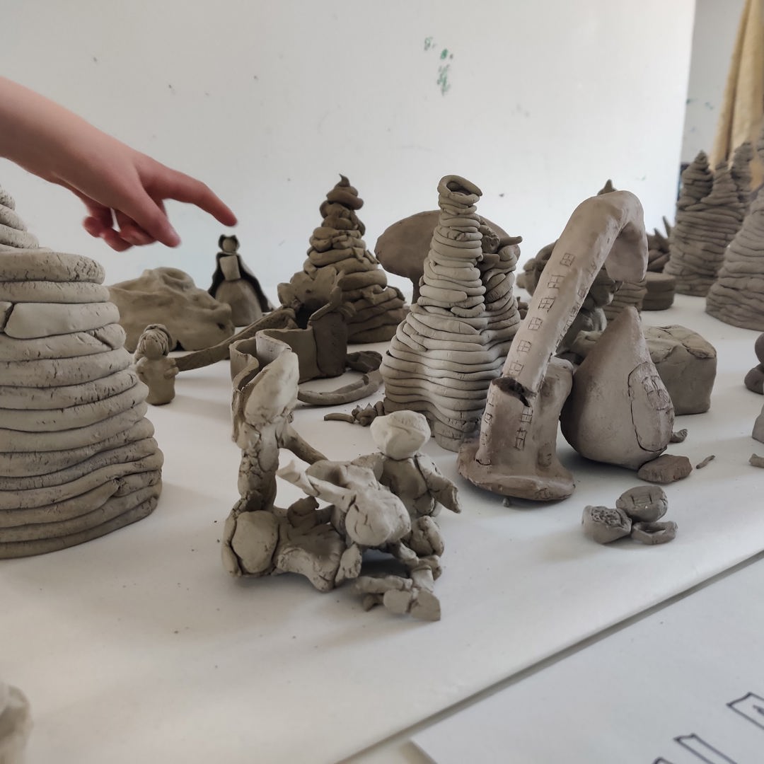 Lerfigurer med finger