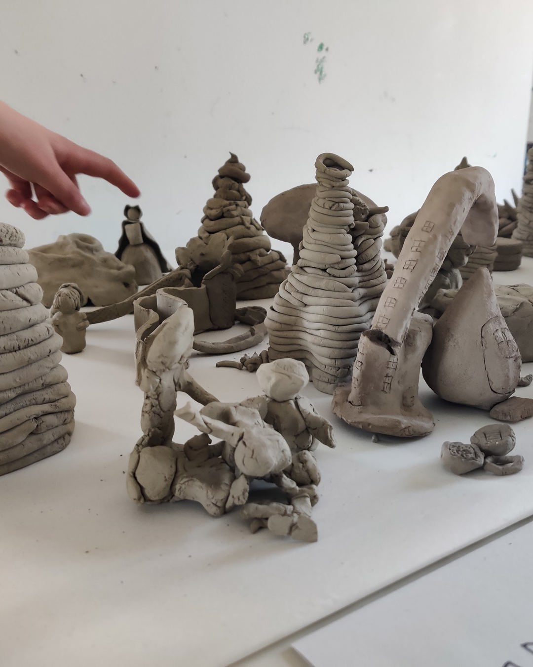 Lerfigurer med finger